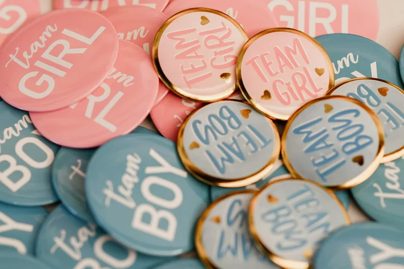 Colorful round balloons at a gender reveal celebration
