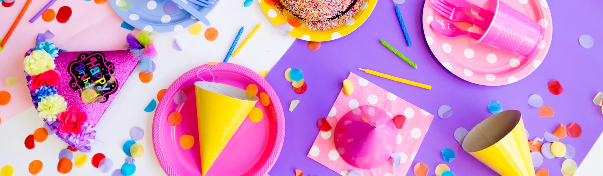 Colorful birthday decorations arranged on a table